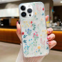 Trblietavý transparentný kryt pre iPhone 16 Pro - rozkvitnutá lúka